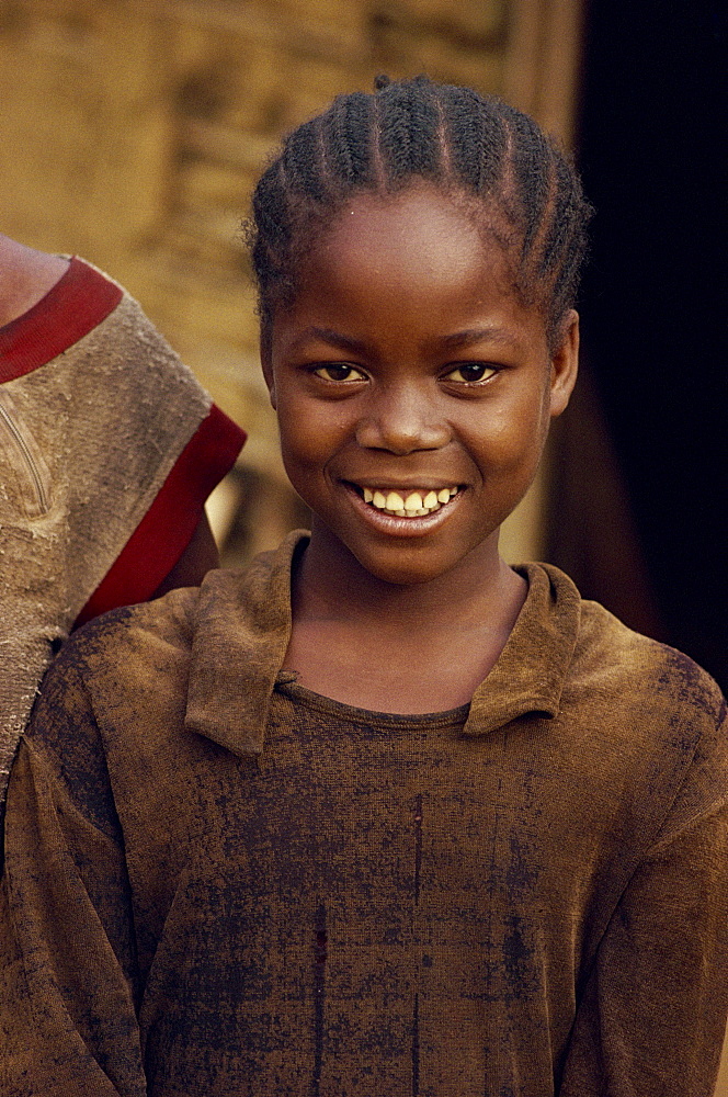 Portrait of young girl from the village of Ntom, Congo, Africa