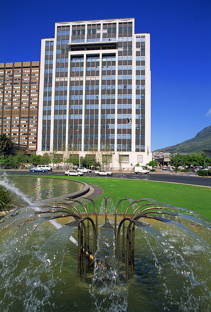 Water fountain on round-a-bout with an office building behind, Central Business District, Cape Town, Cape Province, South Africa, Africa