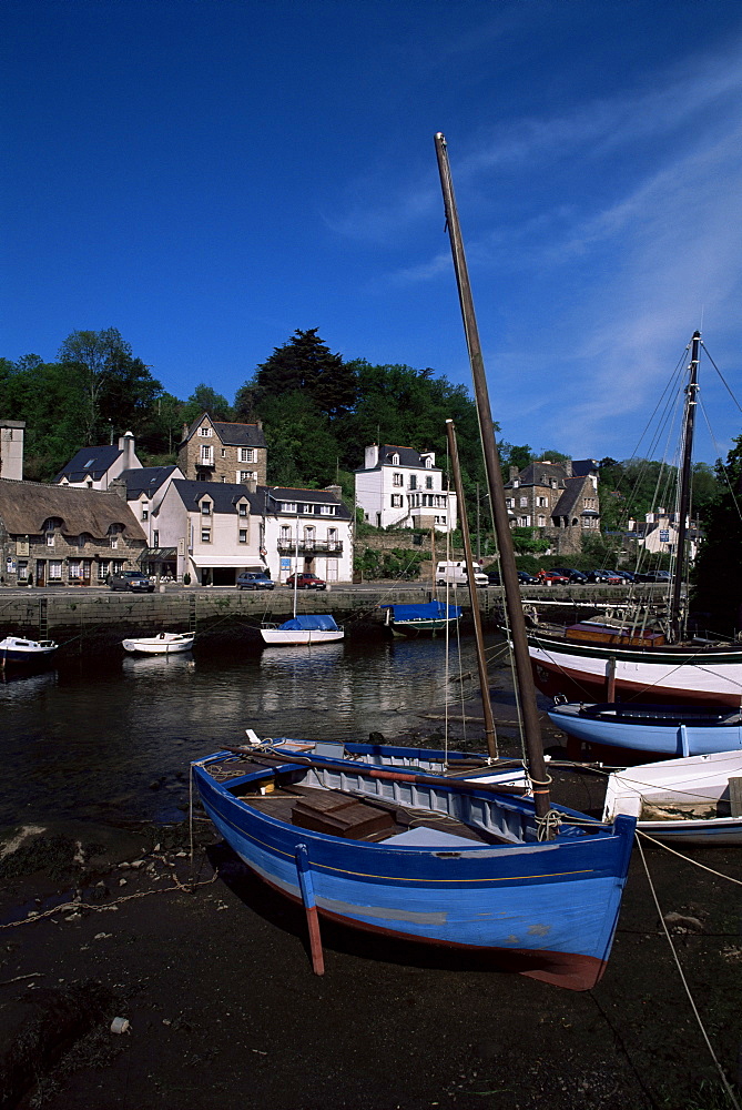 Blue sailing dinghy and River Aven, Pont-Aven, Brittany, France, Europe