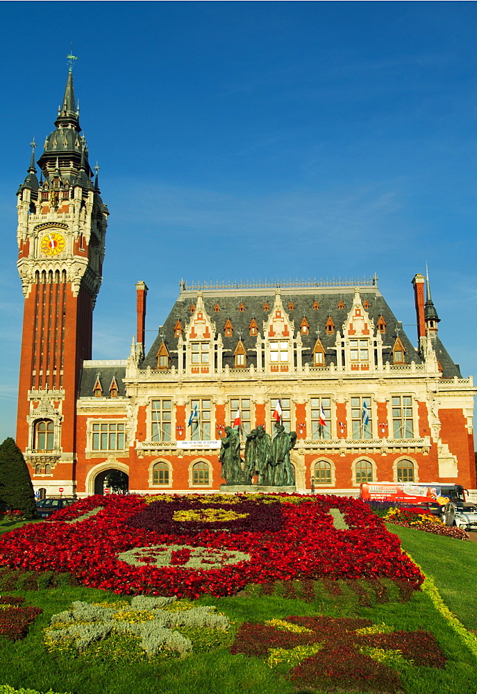 France, Pas-de-Calais, Calais, townhall with flower beds in foreground