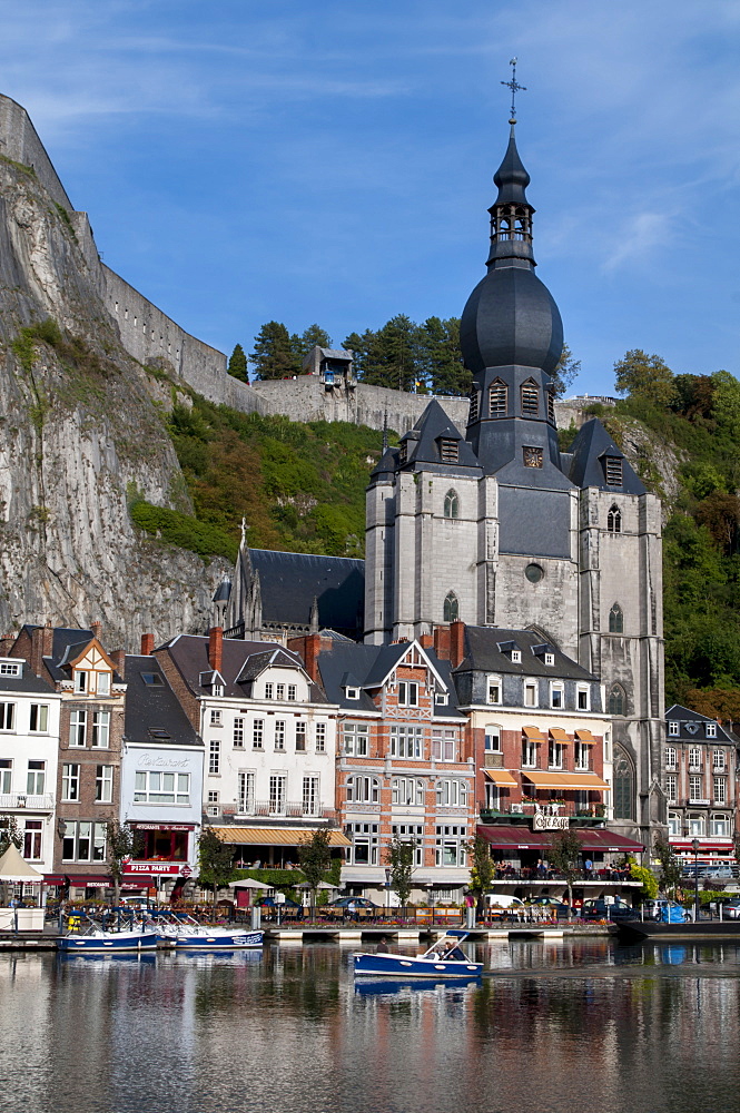 View across River Meuse showing Collegiate Church of Notre-Dame, Dinant, Wallonia, Belgium, Europe