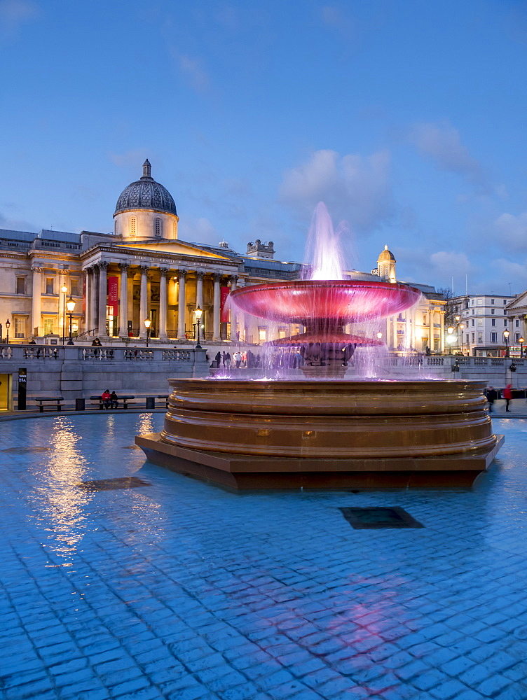 Trafalgar Square fountains and National Gallery at dusk, London, England, United Kingdom, Europe