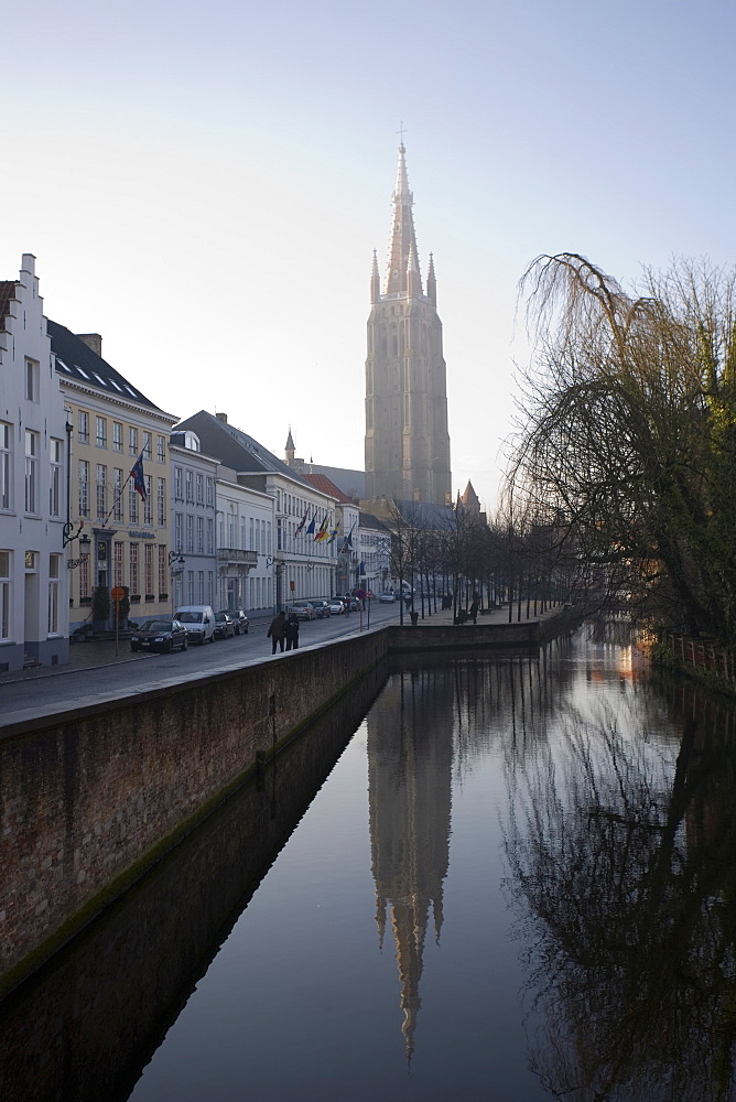 Looking south west along Dijver, towards The Church of Our Lady (Onze Lieve Vrouwekerk), Bruges, Belgium, Europe