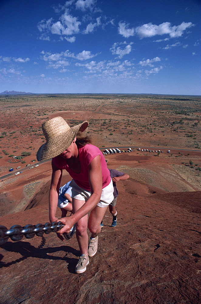 Tourist climbing Ayers Rock, Uluru-Kata Tjuta National Park, Northern Territory, Australia, Pacific