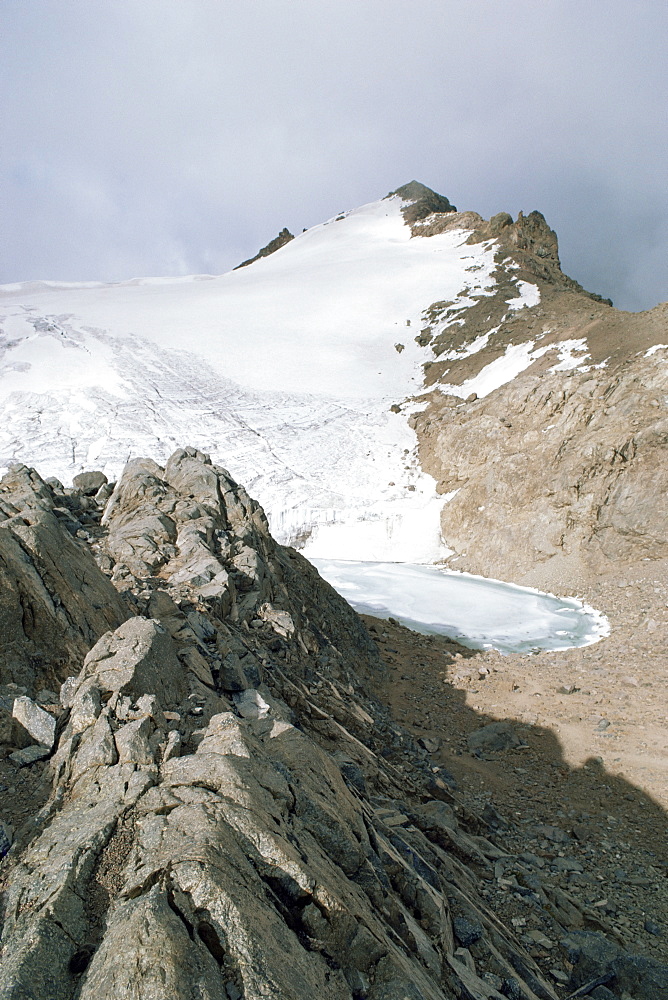 Point Lenana, 4985m, and the Curling Pond, from top hut, Mount Kenya, UNESCO World Heritage Site, Kenya, East Africa, Africa