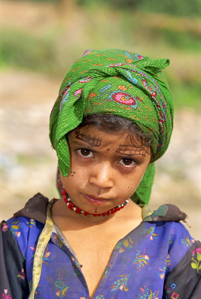 Portrait of a young girl with henna decoration on her face, Al Hajjera village, Haraz Mountains, north Yemen, Middle East