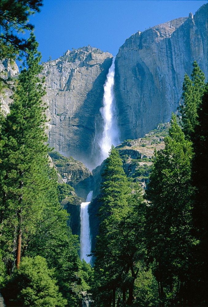 Waterfalls swollen by summer snowmelt at the Upper and Lower Yosemite Falls, in the Yosemite National Park, California, USA 