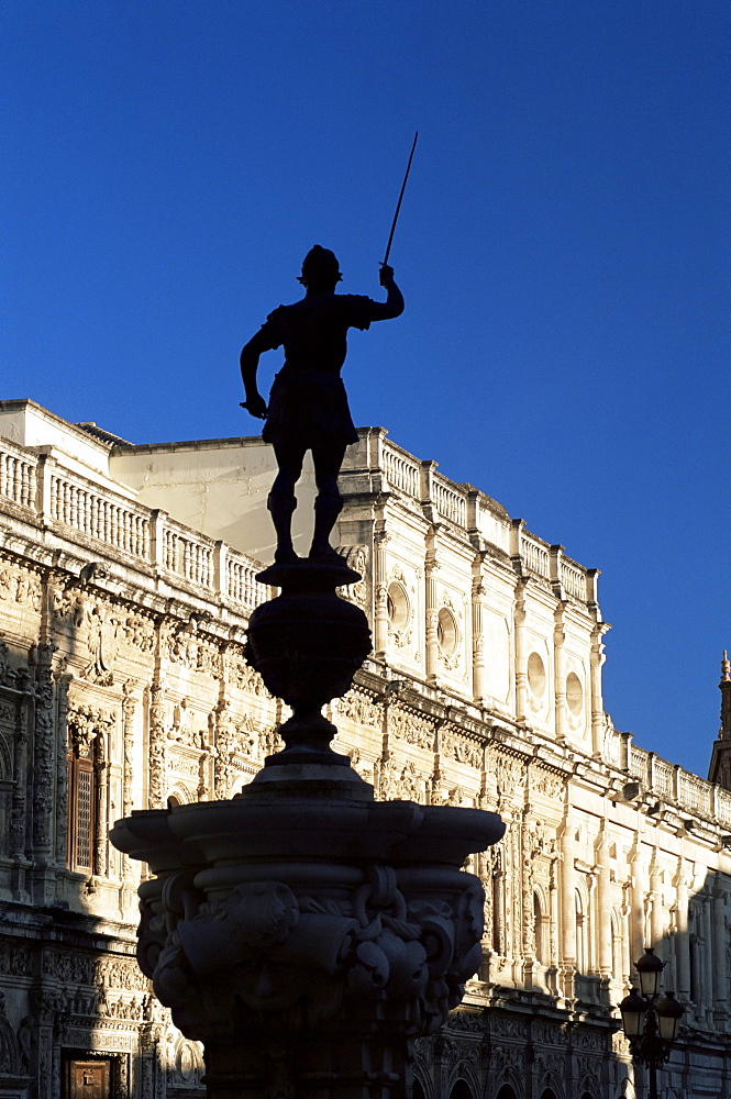 Ornate facade of the City Hall (Ayuntamiento) behind statue, Plaza de San Francisco, Seville, Andalucia (Andalusia), Spain, Europe