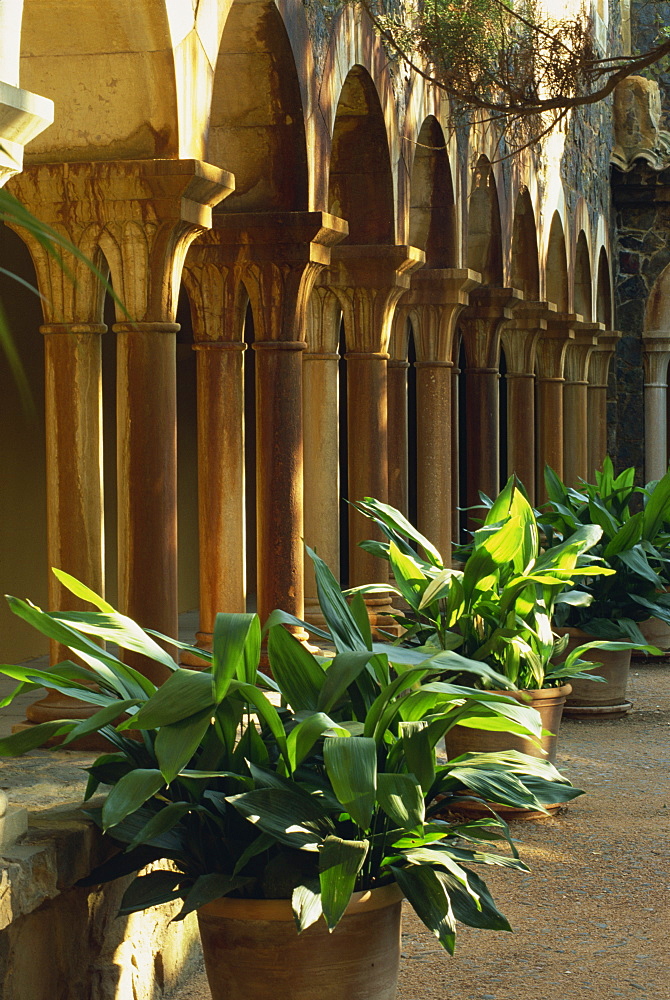 Pillars lining castle courtyard, Cap Roig Botanical Gardens, Calella de Palafrugell, Gerona, Costa Brava, Cataluna, Spain, Europe