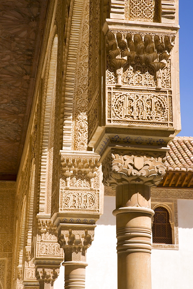 Row of intricately decorated columns in the Patio de los Arrayanes, Casa Real (Palacios Nazaries), Alhambra, UNESCO World Heritage Site, Granada, Andalucia (Andalusia), Spain, Europe