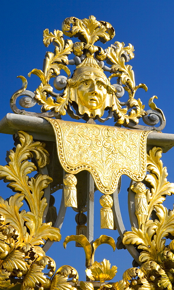 Detail of ornamental wrought iron gate in the Privy Garden, Hampton Court Palace, Borough of Richmond upon Thames, Greater London, England, United Kingdom, Europe