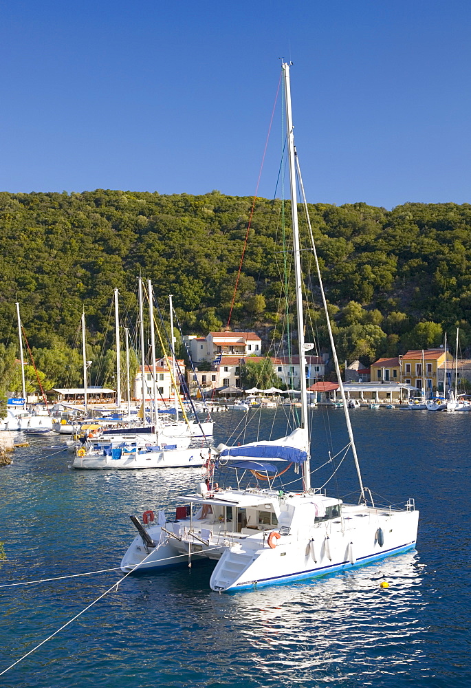 Yachts at anchor in the pretty harbour, Kioni, Ithaca (Ithaki), Ionian Islands, Greek Islands, Greece, Europe