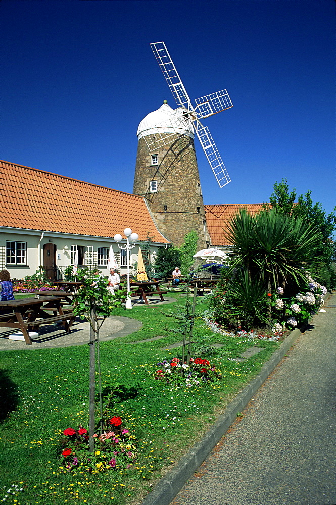 Village pub and windmill, St. Mary, Jersey, Channel Islands, United Kingdom, Europe