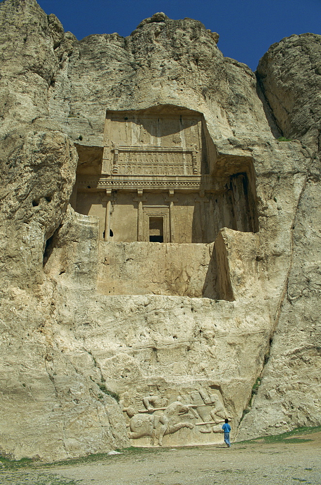 Sassanian carvings showing Hormizd on horseback, dating from 303-309 BC, below the Achaemenian Tomb of Xerxes I, dating from 486-465 BC, Naqsh-e-Rostam, Iran, Middle East