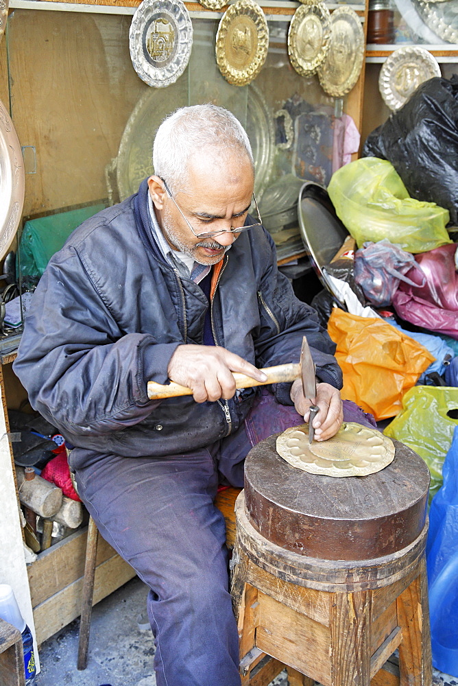 Copper worker in Copper Souq, Ghizdara Street, Tripoli, Libya, North Africa, Africa