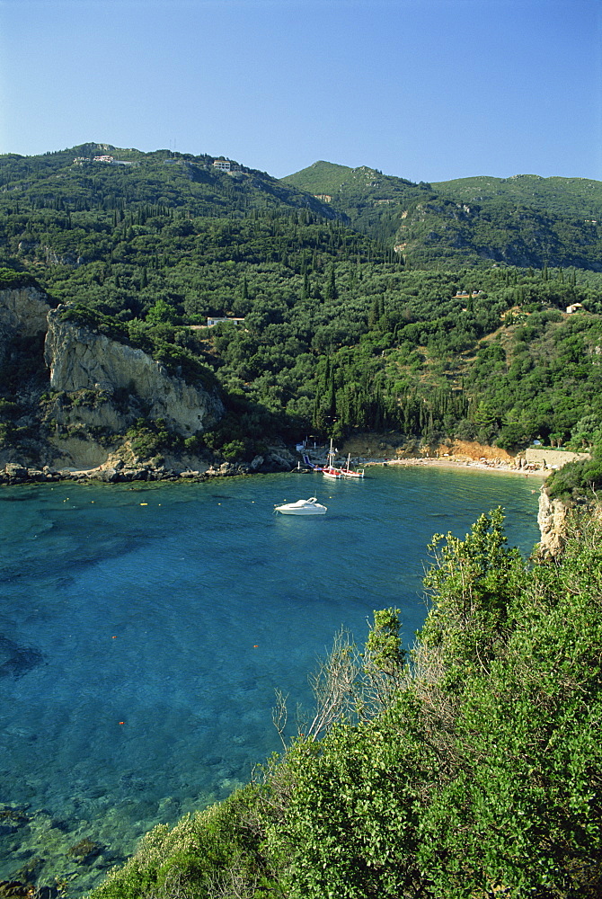 Two boats in a bay at Paleokastritsa, Corfu, Ionian Islands, Greek Islands, Greece, Europe