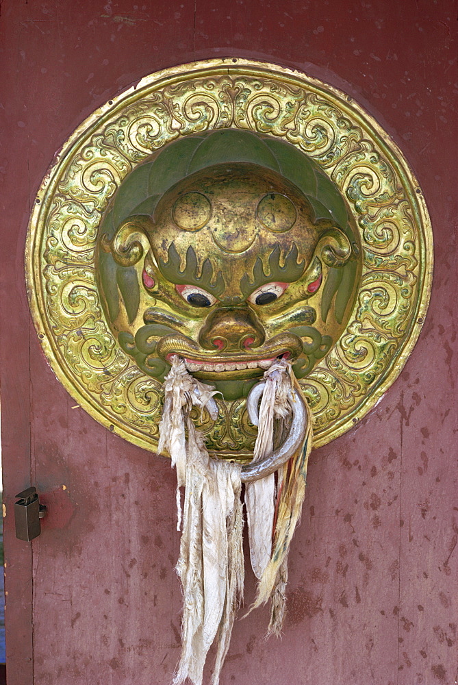 Detail of decorated knob of gate decorated with lion's head, leading to main temple of Erdeni Dzu monastery at Karakorum, Mongolia, Central Asia, Asia