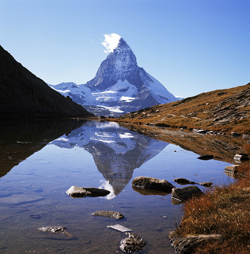 The Matterhorn, 4478m, from the east, over Riffel Lake, Swiss Alps, Switzerland, Europe