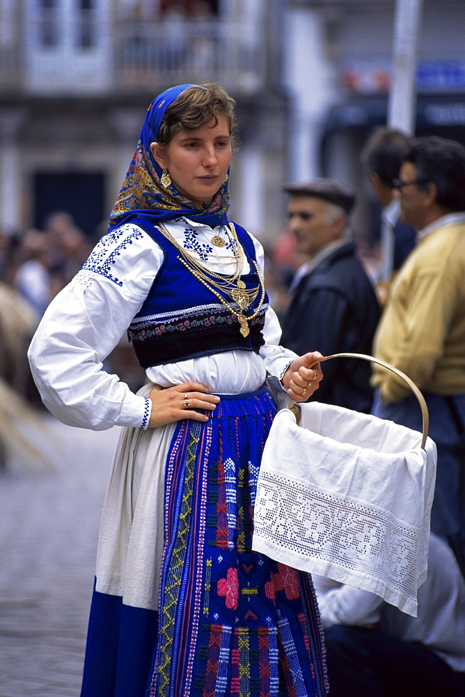 Young woman in folk dress, New Fairs, Ponte de Lima, Minho, Portugal, Europe