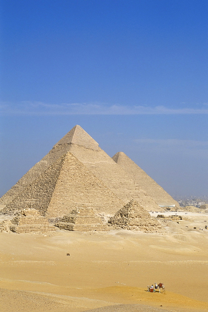 The Pyramids at Giza, UNESCO World Heritage Site, with Cairo in the background, Egypt, North Africa, Africa