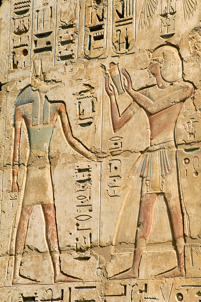 Relief of the pharaoh Ramses III and the god Anubis, Medinet Habu, UNESCO World Heritage Site, West Bank, Thebes, Egypt, North Africa, Africa