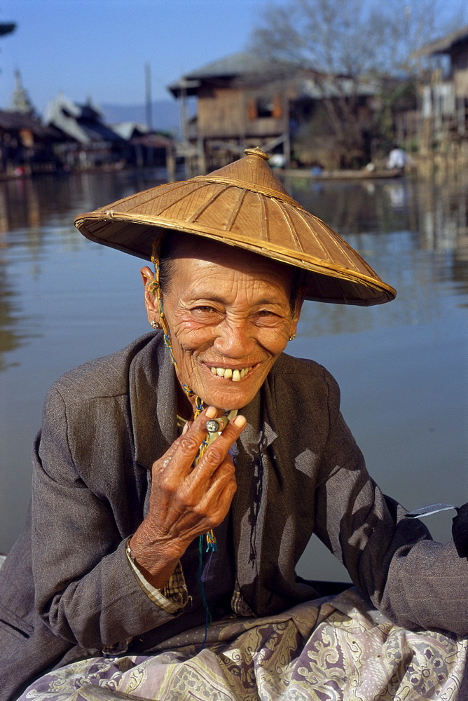 Portrait of an old woman with straw hat and cheroot, Inle Lake, Shan State, Myanmar (Burma), Asia