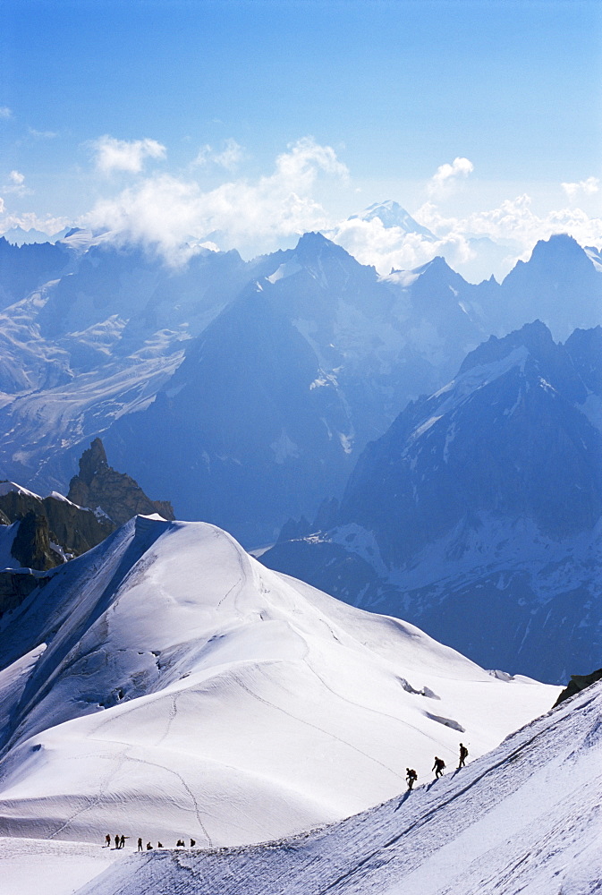 View from Mont Blanc towards Grandes Jorasses, with mountaineers on Cosmiques Ridge, Mont Blanc, French Alpes, France, Europe