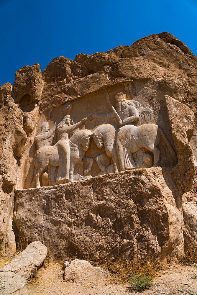 Carved relief of the Investiture of Ardashir I, 224-239 AD, Naqsh-e Rostam Necropolis, near Persepolis, Iran, Middle East