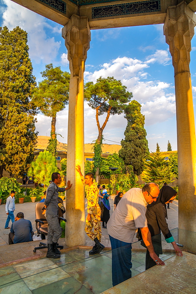 Poetry lovers paying respects at Tomb of Hafez, Iran's most famous poet, 1325-1389, Shiraz, Iran, Middle East