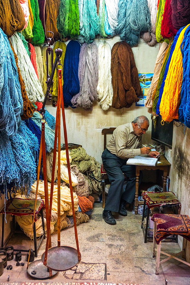 Carpet wool dealer, Old Bazaar, Kashan, Iran, Middle East