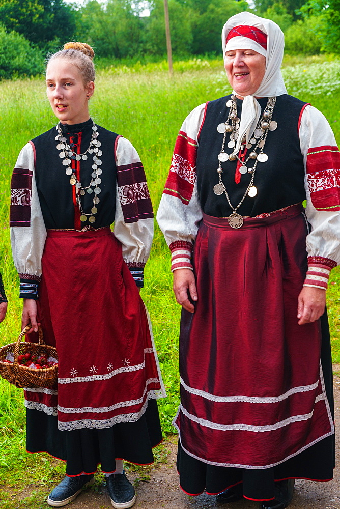 Seto mother and daughter, singing polyphonically at a Feast Day, Uusvada, Setomaa, SE Estonia, Europe