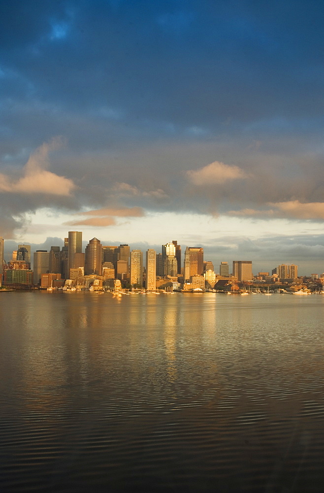 The skyline of the Financial District across Boston Harbor at dawn, Boston, Massachusetts, USA