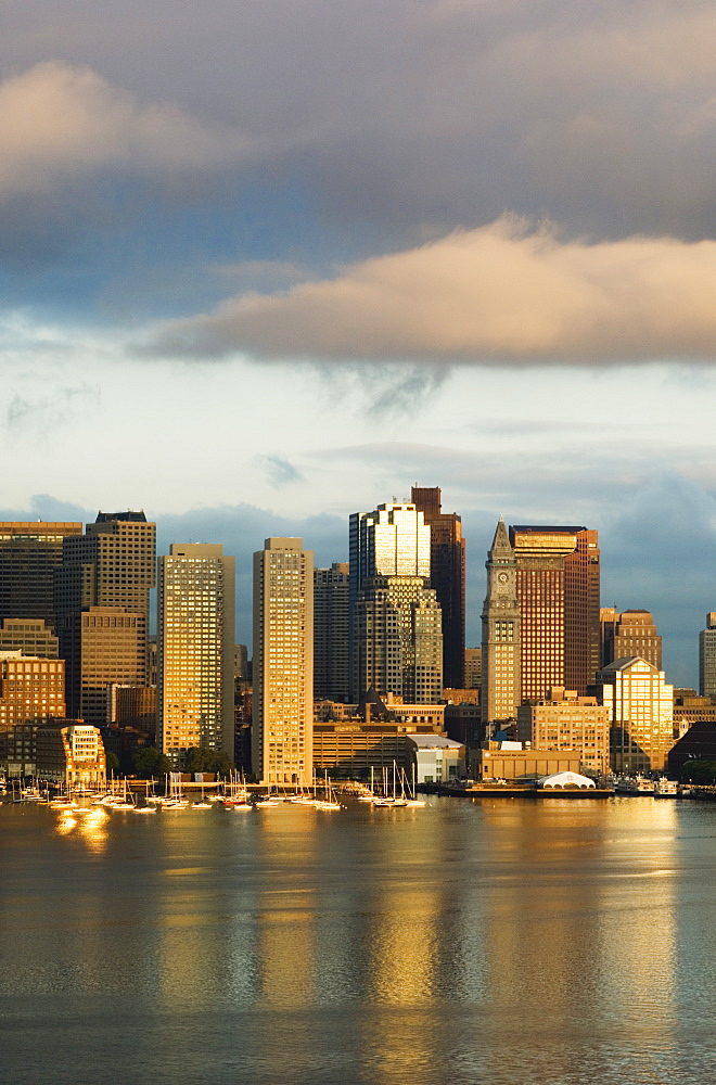 The skyline of the Financial District across Boston Harbor at dawn, Boston, Massachusetts, USA