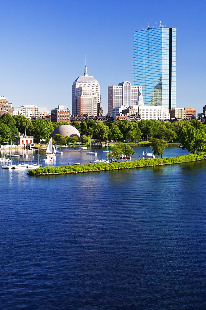 The John Hancock Tower and city skyline across the Charles River, Boston, Massachusetts, USA