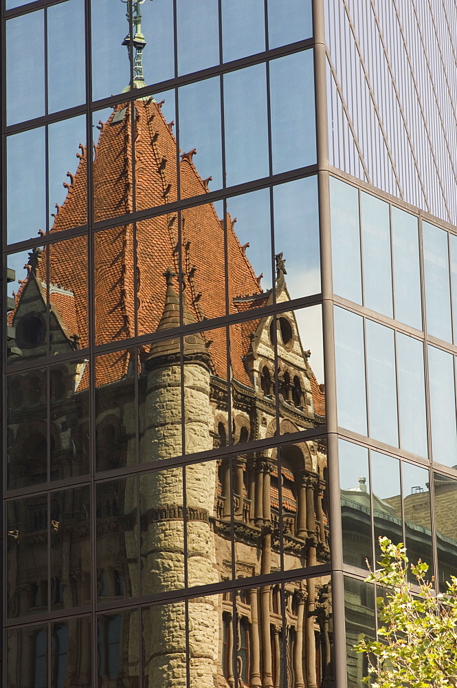 Trinity Church reflected in the glass windows of the Hancock Tower, Copley Square, Boston, Massachusetts, New England, United States of America, North America