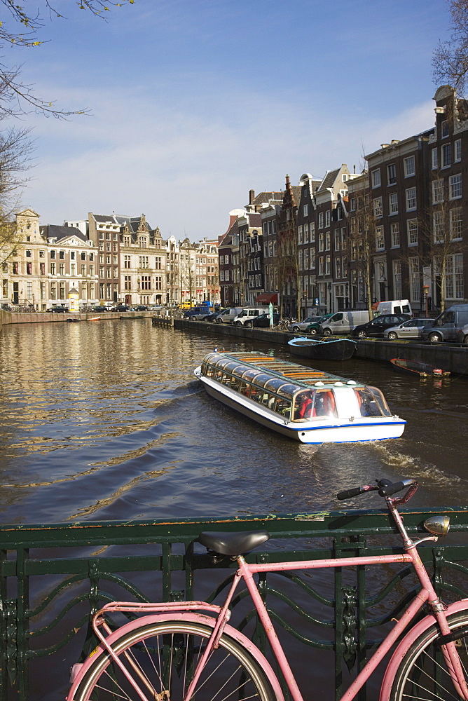 Tourist canal boat on the Herengracht canal, Amsterdam, Netherlands, Europe