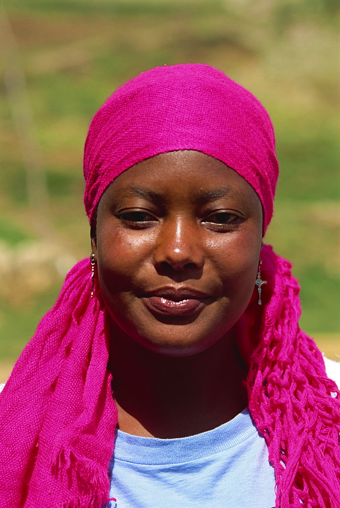 Wife of the owner of general store, wearing pink headscarf, Godet, Haiti, West Indies, Central America