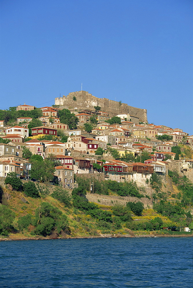 The town and castle on the skyline at Molyvos, on Lesbos, North Aegean Islands, Greek Islands, Greece, Europe