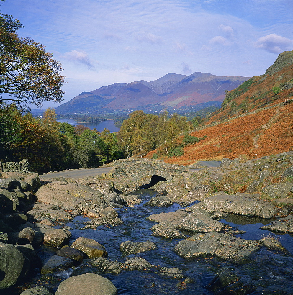 Ashness Bridge over river running into Derwent Water, with Skiddaw behind, Lake District National Park, Cumbria, England, United Kingdom, Europe