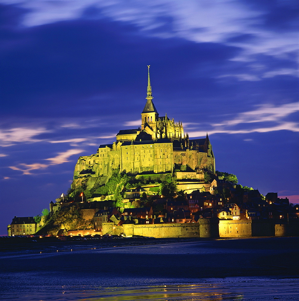 Mont St. Michel, UNESCO World Heritage Site, illuminated at dusk, La Manche region, Basse-Normandie, France, Europe