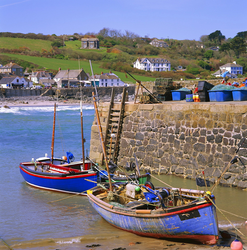 Small boats by the quayside, Coverack, Cornwall, England, UK