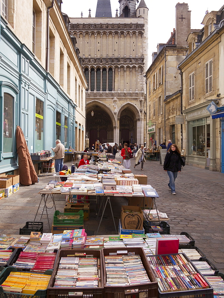 Booksellers' market stalls on Rue Musette and Church of Notre Dame, Dijon, Burgundy, France, Europe