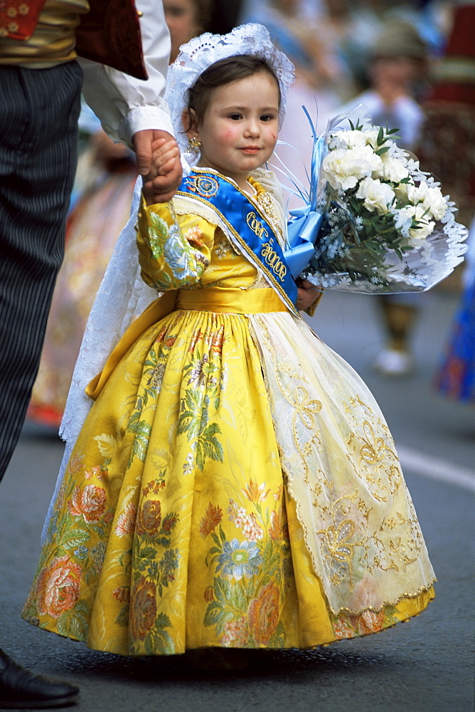 Little girl in procession of Falleros during Las Fallas Fiesta, Valencia, Spain, Europe