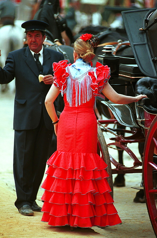 Seville - Spain - The Feria de Abril - Seville Fair - A Sevillana getting into her carriage for the afternoon parades 