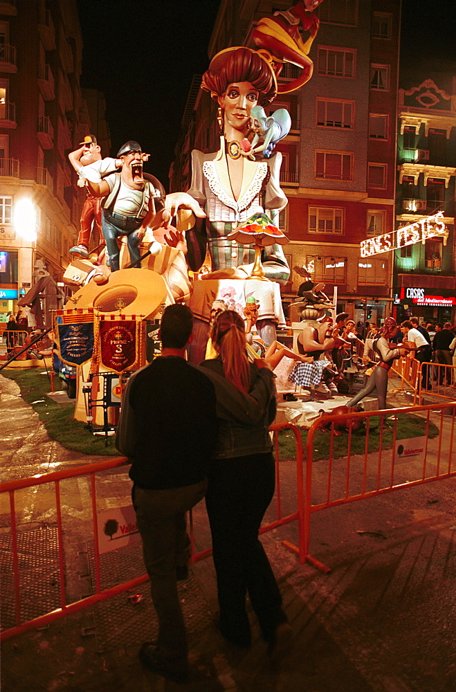 Valencia - Spain - Las Fallas Fiesta - Spectators viewing one of the giant Fallas