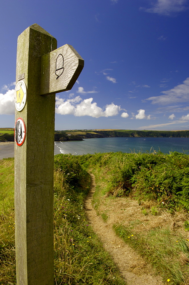 Footpath sign for the Pembrokeshire Coast Path at Broad Haven, Wales, United Kingdom, Europe