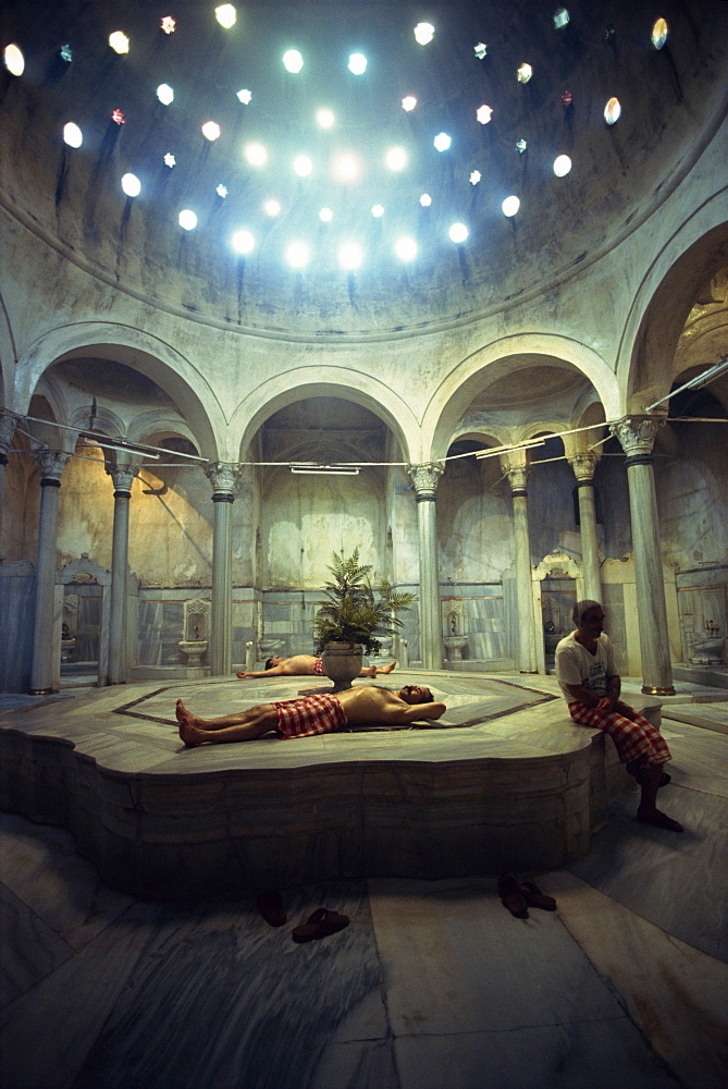 Men relax in the Cagologlu Hamami, Turkish Bath, in Istanbul, Turkey, Europe