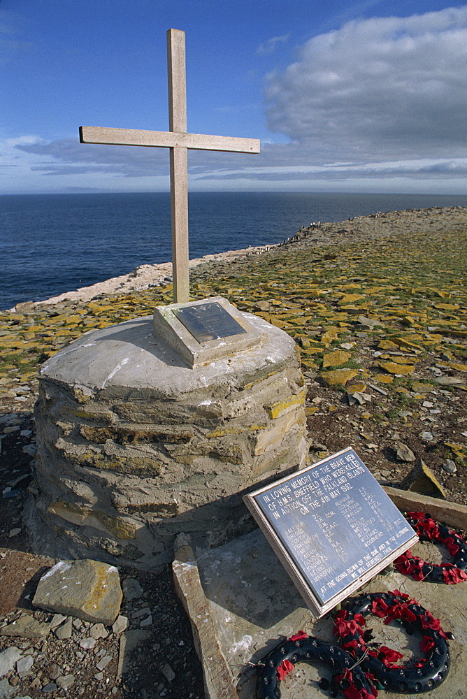 Poppy wreaths laid on the 1982 War Memorial to the dead of HMS Sheffield on Sealion Island in the Falkland Islands, South America