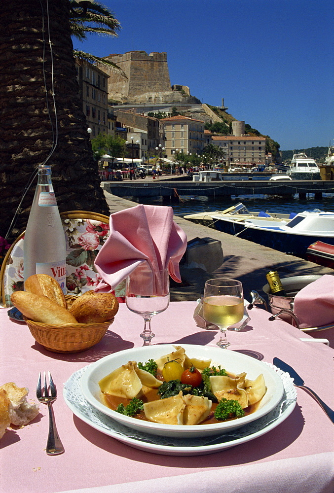 Meal on an outdoor table of the La Caravelle Restaurant, Bonifacio, Corsica, France, Europe