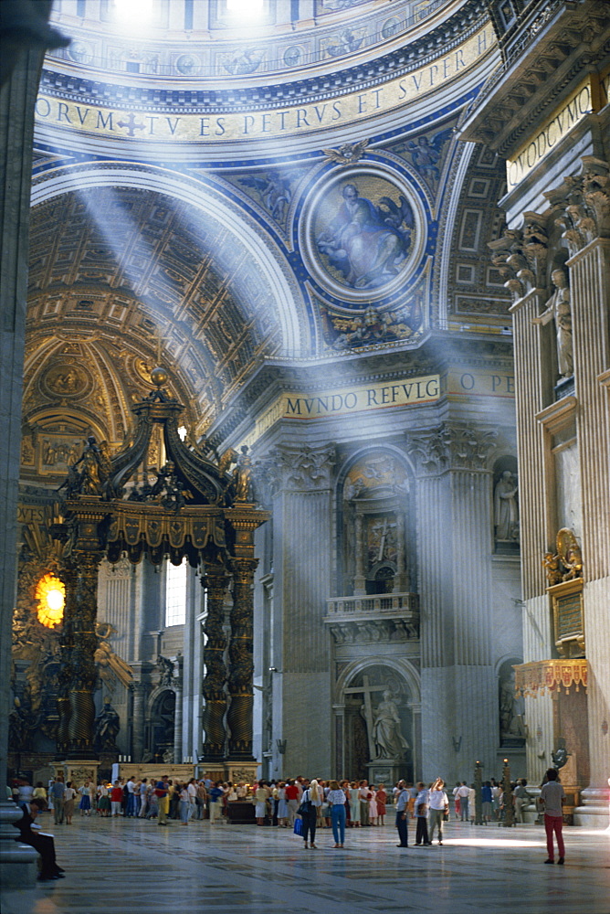 Tourists in the interior of St. Peters Basilica in Rome, Lazio, Italy, Europe